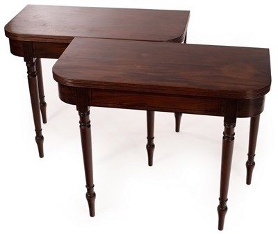 Lot 499 - A pair of Regency mahogany fold-over card...