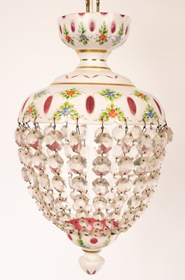 Lot 630 - A Bohemian glass pendant light of red and...