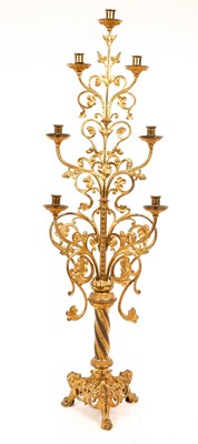 Lot 634 - A gilt metal candle stand, with six-branches...