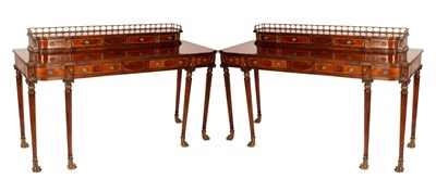 Lot 704 - A pair of Georgian style console tables by...