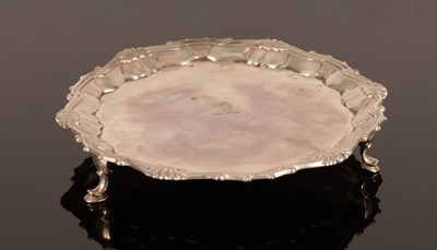 Lot 80 - A George II silver card waiter, William...