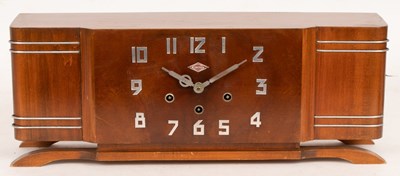 Lot 732 - A 1930's IROD mantel clock in a walnut case...