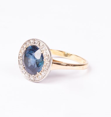 Lot 109 - An 18ct yellow gold Art Deco style sapphire and diamond circular cluster ring