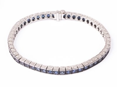 Lot 46 - A platinum and sapphire line bracelet