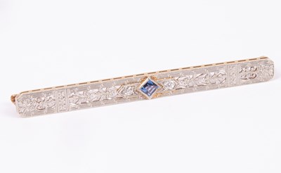 Lot 64 - An Edwardian style 14k yellow and white gold sapphire and diamond bar brooch