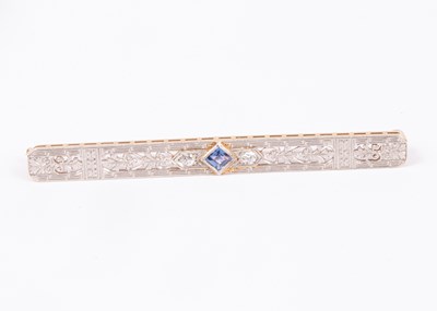 Lot 64 - An Edwardian style 14k yellow and white gold sapphire and diamond bar brooch
