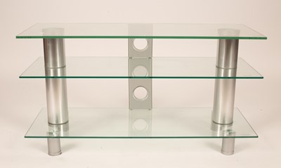 Lot 495 - A modern glass three-tier TV console/table...