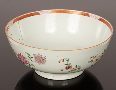 Lot 304 - A Chinese famille rose punch bowl and a plate,...