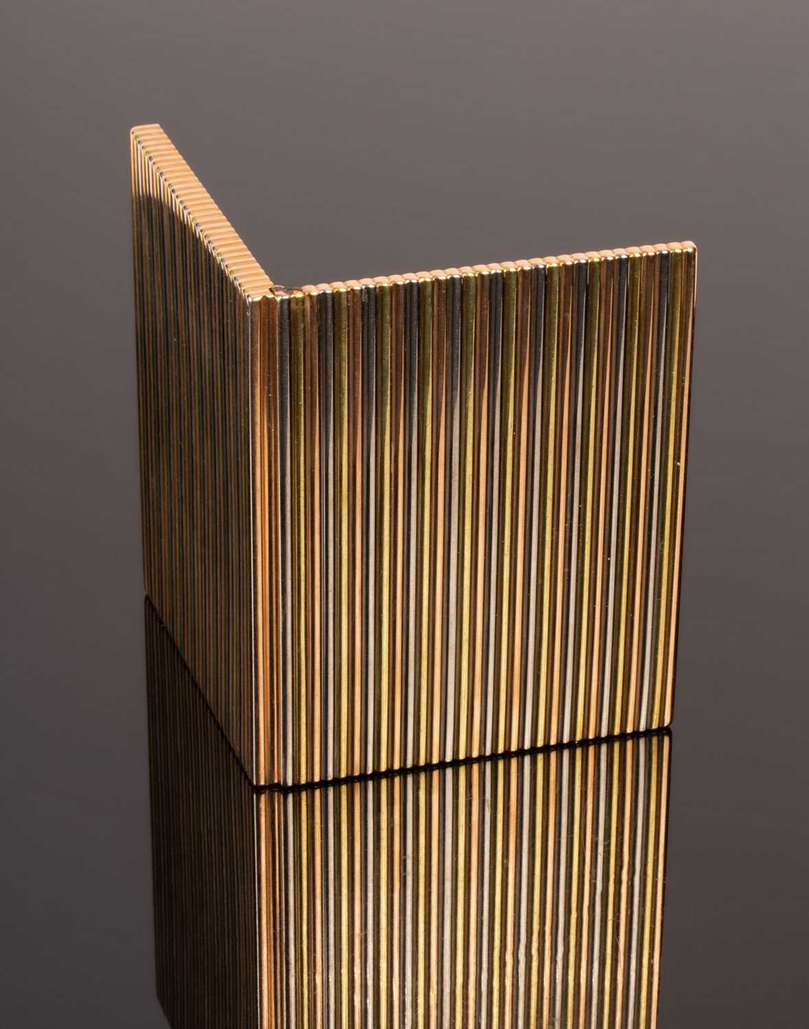 Lot 21 - An 18ct three coloured gold cigarette case,...