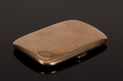 Lot 23 - A 9ct gold cigarette case of plain curved form,...
