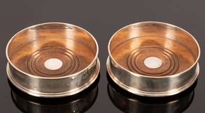 Lot 51 - A pair of modern silver wine coasters, London...