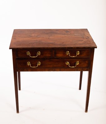 Lot 707 - A George III walnut side table fitted two...