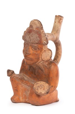 Lot 13 - A North coast Peruvian stirrup vessel, Mochica...