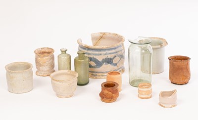 Lot 29 - A collection of apothecary bottles and...