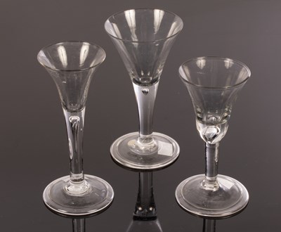 Lot 310 - Three 18th Century wine glasses with tear...