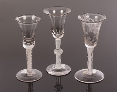 Lot 314 - Two 18th Century wine glasses with bell bowls,...