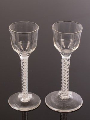 Lot 316 - Two 18th Century wine glasses with ogee bowls,...