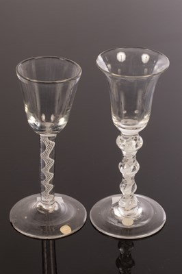 Lot 317 - Two 18th Century wine glasses, one with a...