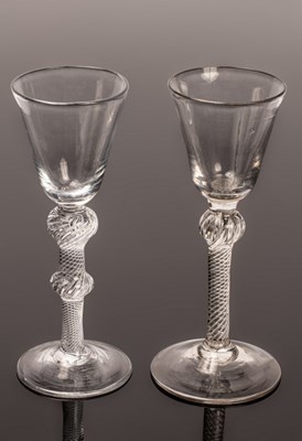 Lot 319 - Two 18th Century air twist drinking glasses...