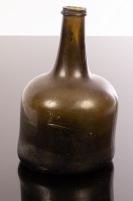 Lot 320 - A mid 18th Century green glass wine bottle of...