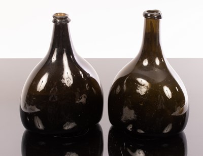 Lot 328 - Two late 18th Century dark-olive-green glass...
