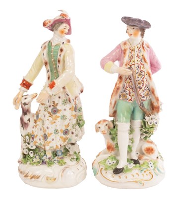 Lot 352 - A near pair of Derby figures of hunter and...