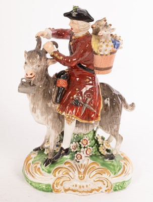 Lot 364 - A Derby Welsh tailor on his goat, 15cm high