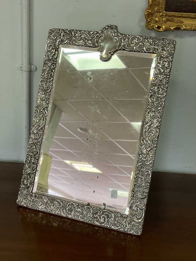 Lot 2 - A silver easel back mirror, CD, London 1913,...