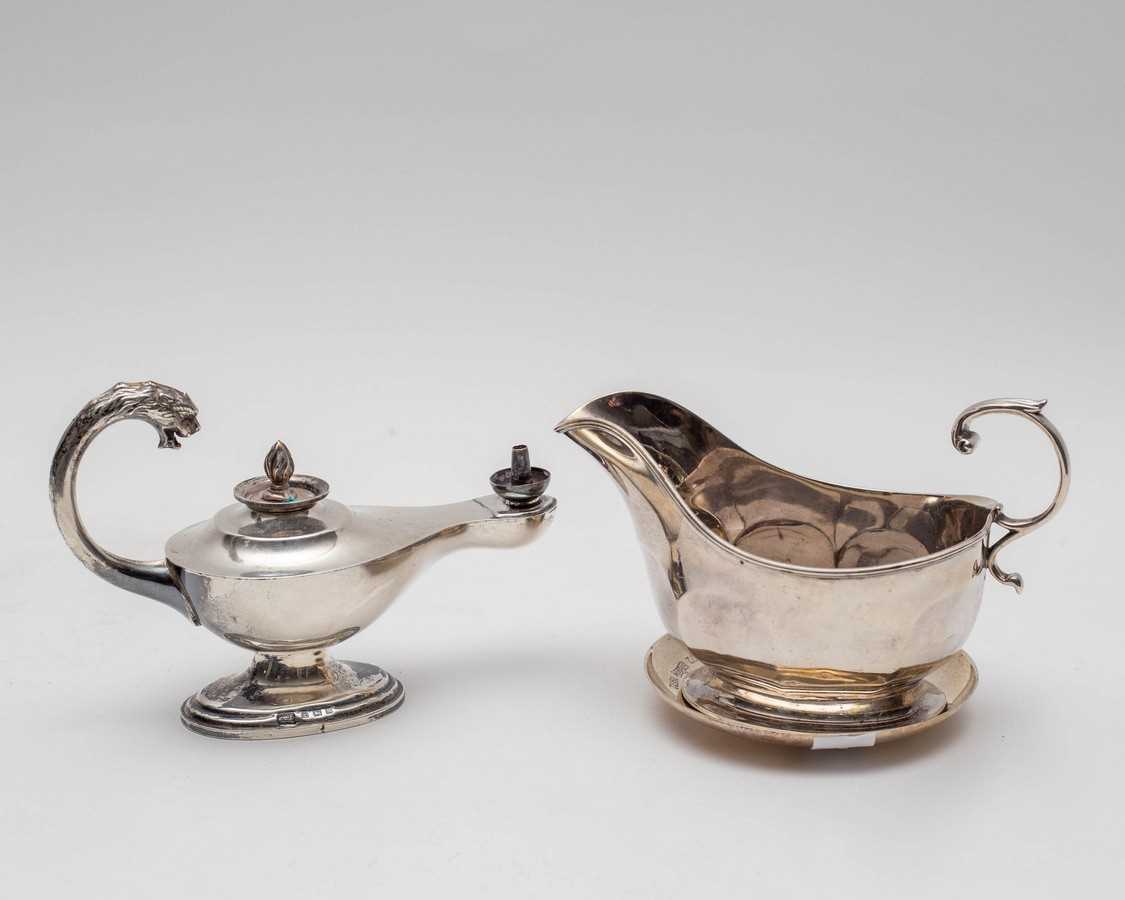 Lot 16 - A silver mounted Aladdin lamp table cigar...
