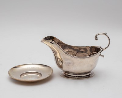 Lot 16 - A silver mounted Aladdin lamp table cigar...