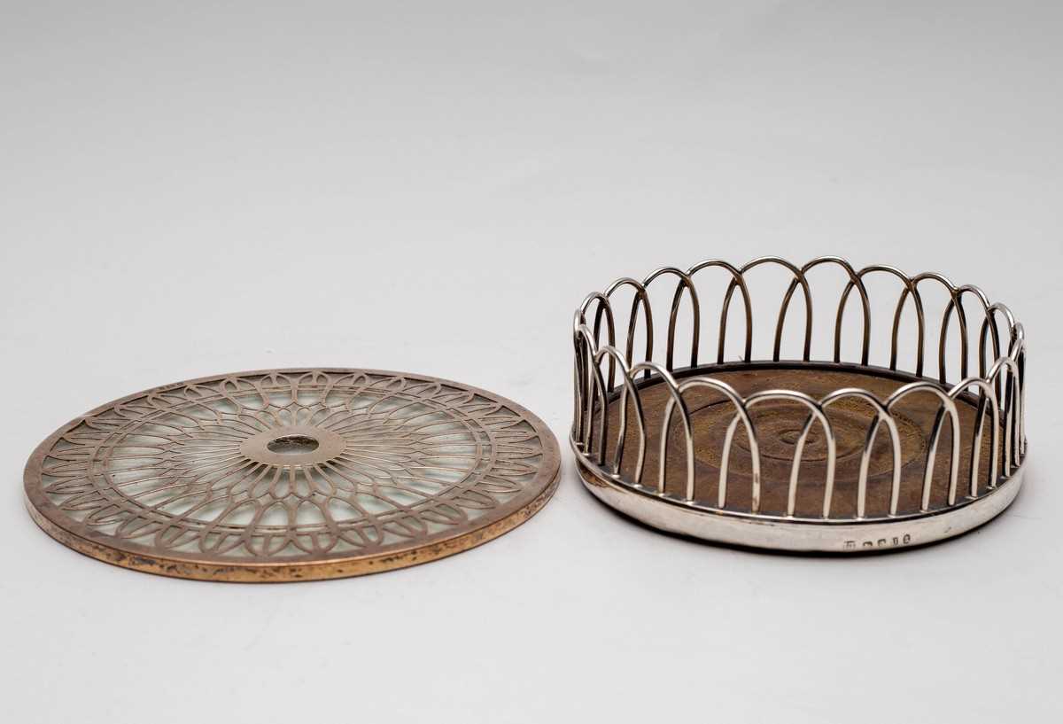 Lot 17 - A George III silver mounted wine coaster,...