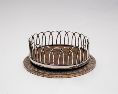 Lot 17 - A George III silver mounted wine coaster,...