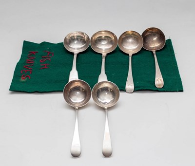 Lot 26 - A pair of George III silver ladles, makers...