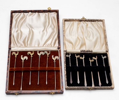 Lot 32 - A set of six silver novelty cocktail sticks...