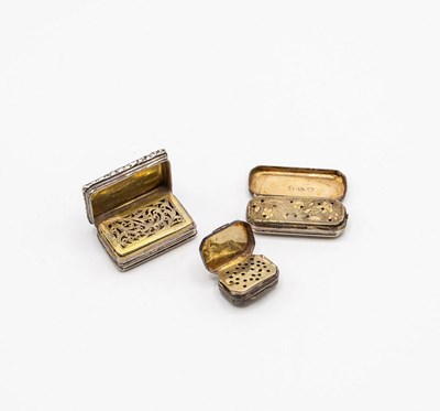 Lot 46 - Three Georgian silver vinaigrettes, the...