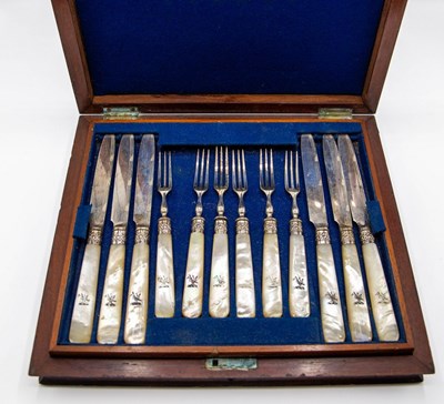 Lot 71 - A set of twelve Edwardian silver dessert...