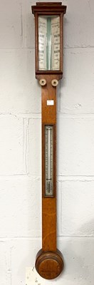 Lot 506 - An oak cased stick barometer by Bryson,...