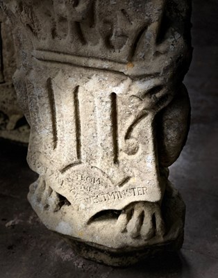 Lot 617 - Three carved stone figures of lions, each...