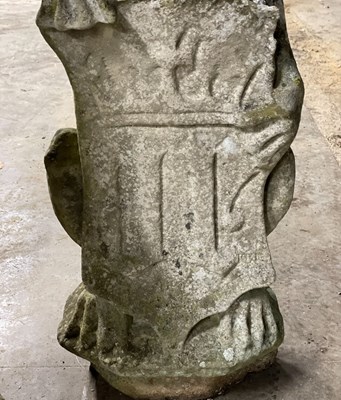 Lot 617 - Three carved stone figures of lions, each...