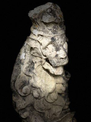 Lot 617 - Three carved stone figures of lions, each...