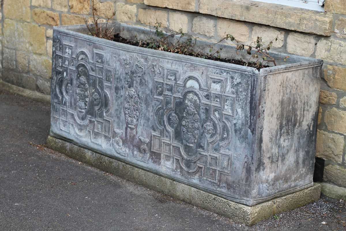 Lot 655 - A fine lead water cistern, dated 1735, cast...