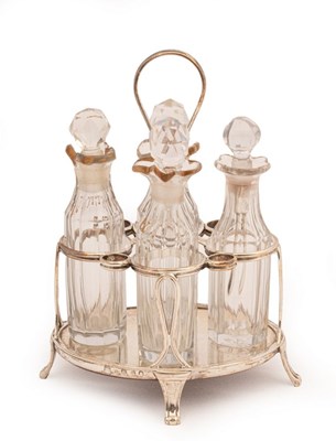 Lot 11 - A George III silver and cut glass cruet stand,...