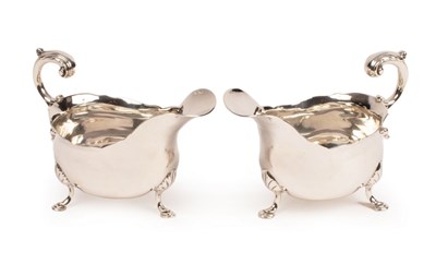 Lot 15 - A pair of George III silver sauce boats,...