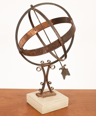 Lot 410 - An Armillary sphere on a square stone base,...