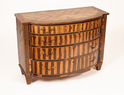 Lot 434 - A Dutch laburnum chest of drawers, circa 1800,...