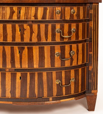 Lot 434 - A Dutch laburnum chest of drawers, circa 1800,...