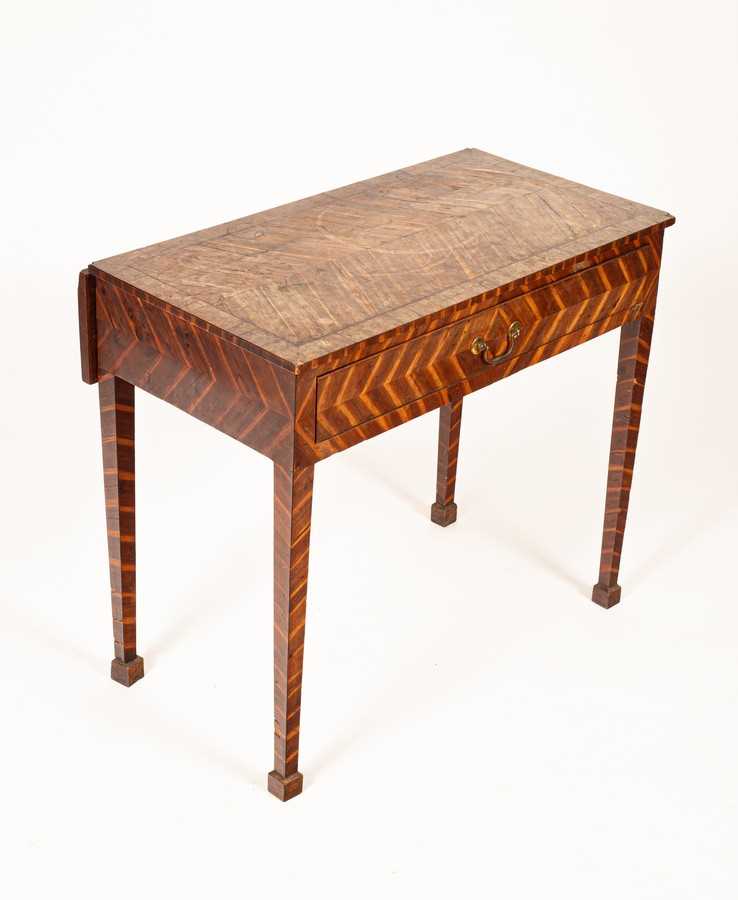 Lot 435 - A George III Scottish laburnum bedroom table,...