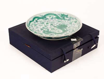 Lot 44 - A cased Chinese polychrome porcelain plate,...