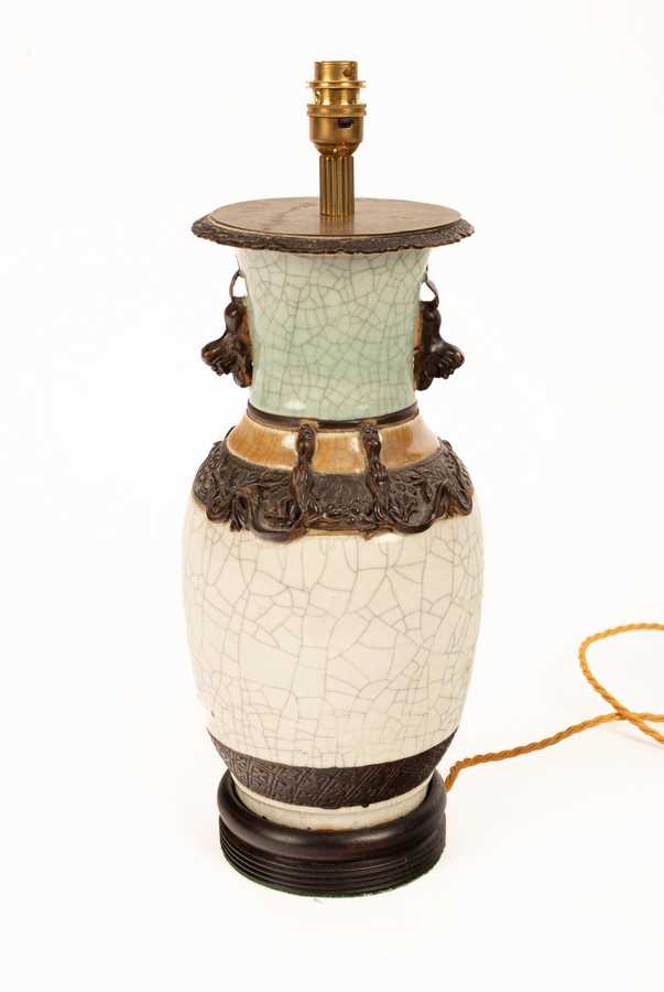 Lot 46 - A Chinese polychrome porcelain vase, 20th...
