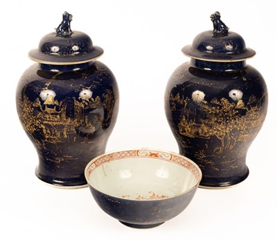 Lot 76 - A pair of powder blue ground and gilt baluster...